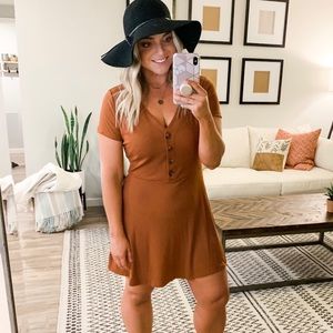 Women’s size medium, rust colored, dress